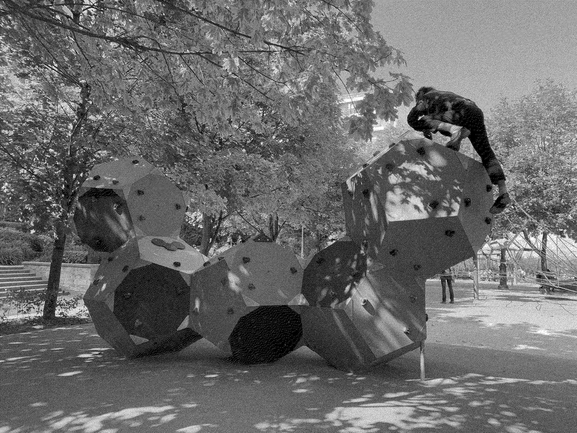 Gijs climbing a playground in Paris