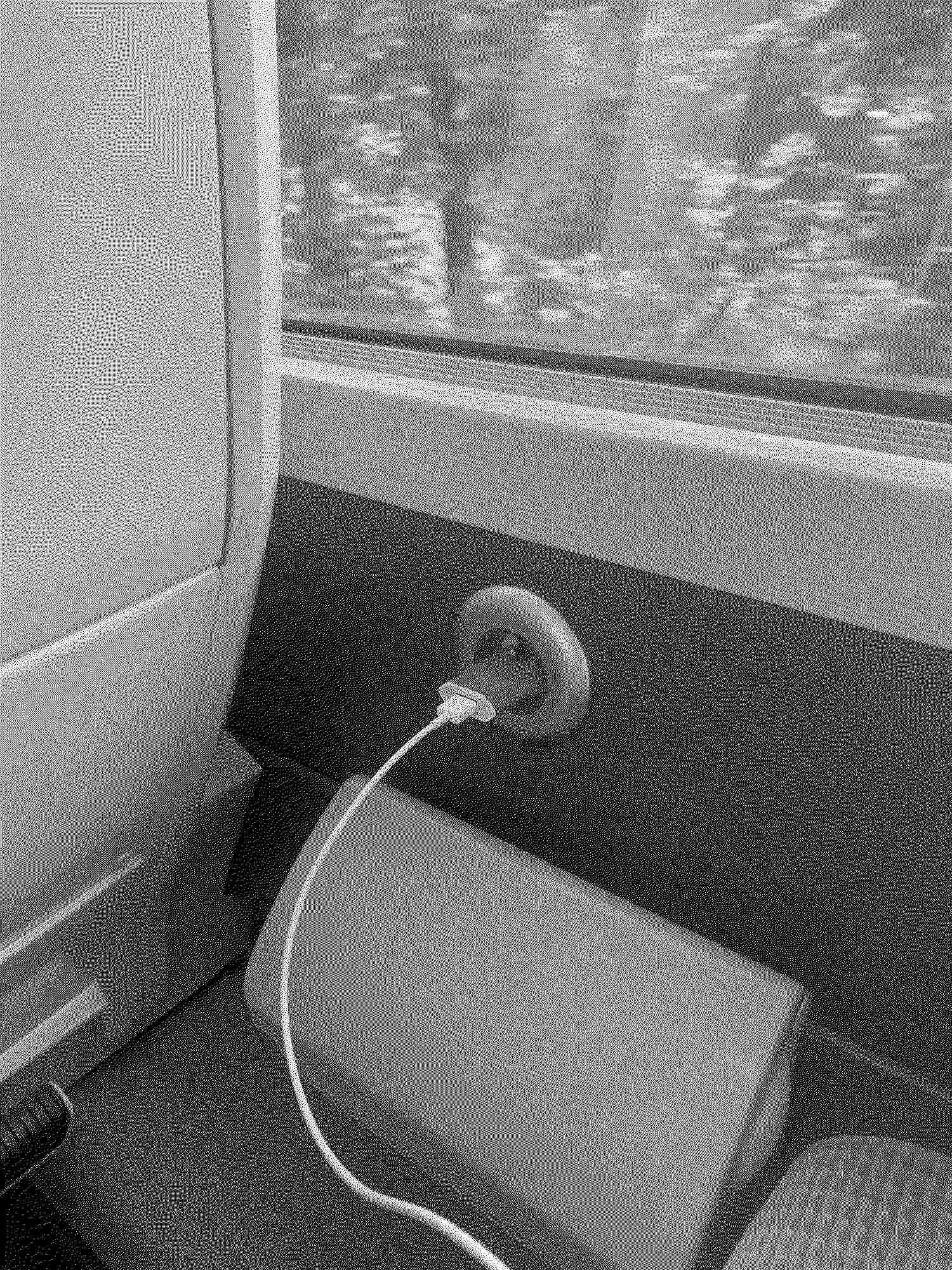 Emma's phone charger on the train